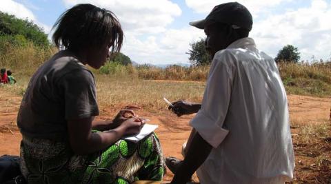 ICS volunteer Dorothy Mwalweni interviewing Mr. Raphael Nkosi ICS volunteer Dorothy Mwalweni interviewing Mr. Raphael Nkosi