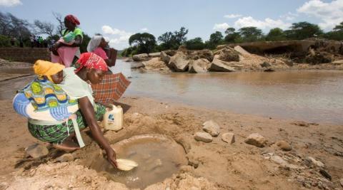 Pictured: Women collecting water in Zimbabwe, where a woman's role is often to become a wife and look after household chores. 